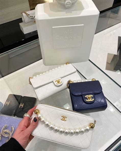 chanel pearl short handle with chain clutch|chanel clutch shoes.